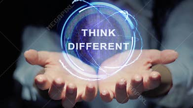 Hands show round hologram Think different