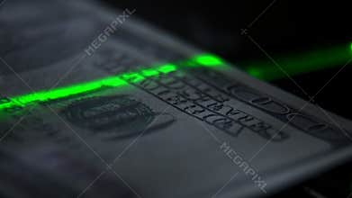 Elements and signs on a 100 banknote: a portrait of the president