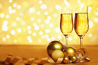 Champagne and golden Christmas ornaments