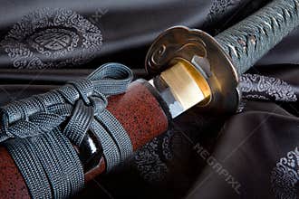 Japanese sword on silk