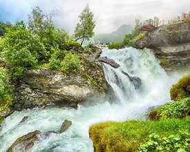 Waterfall in the town Geiranger, Norway