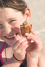 Happy girl with seashell