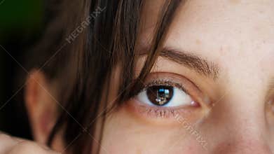 Portrait of a girl who removes bangs from her face