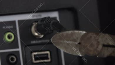 Cutting the Cable TV Cord with a wire cutter tool