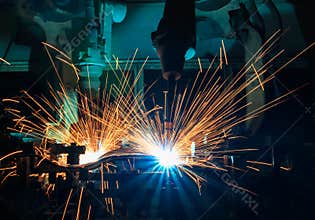 Industrial welding robots are movement welding in production line