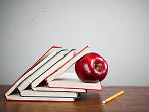 Red apple on books