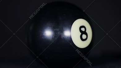 Eight ball on a billiard table