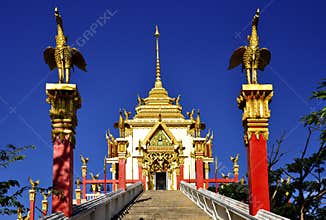 Beautiful Buddhist architecture soaring into blue sky