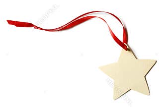 Blank, star-shaped Christmas gift tag with red ribbon isolated on white background