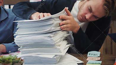 Businessman has too much paperwork