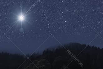 star shines over the manger of christmas of Jesus Christ
