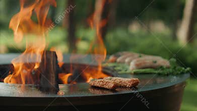 Man cooking bbq meat on grill outdoors. Man putting meat sticks with forceps