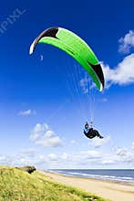 Sky surfer paraglider keeping 1.5 meter from the crowd in the air