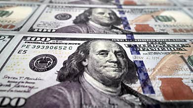 One hundred dollar bill printing money concept. 100 dollar banknote. 4k high quality ungraded footage