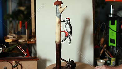 Automaton woodpecker bird pecking