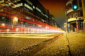 Urban city road with car light trails