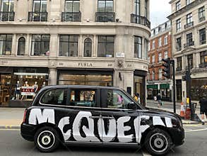 Iconic London cab on the streets of England capital city