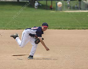 Youth baseball pitcher with clipping path