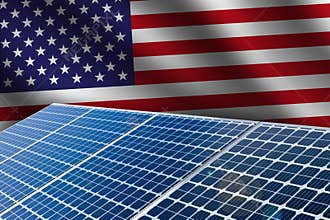 United States adapting Solar Energy concept with panels and waving flag in the background. Green and renewable energy backdrop