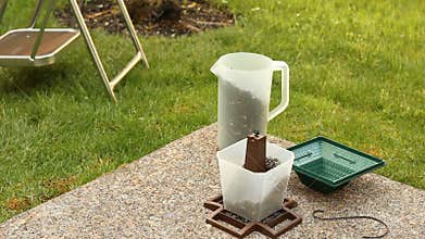Filling a Bird Feeder