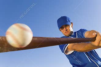 Player Hitting Ball With Baseball Bat