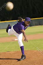 Baseball Pitcher Throwing Ball