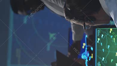 Workplace of the air traffic controllers in the control tower. Team of professional aircraft control officers works