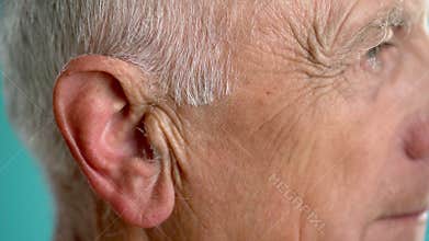 Close-up of old male ear, body parts concept