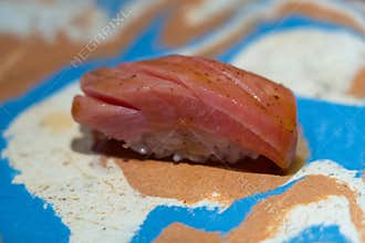 Chotoro sushi in omakase course - aging fatty tuna sushi