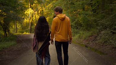 Friends walking and talking in nature