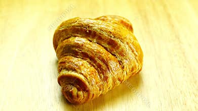 Closeup view of freshly baked delicious homemade french croissant.