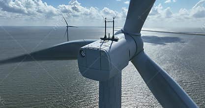 Wind turbine at Breezanddijk, De Afsluitdijk, The Netherlands, close up aerial view.