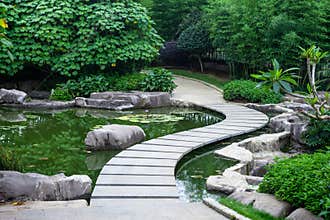 Garden path by pond