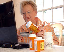 Senior woman buying medicine