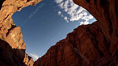 Majestic canyon skies: timelapse of clouds moving over red rock formations