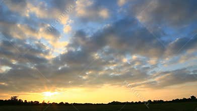 Sunset timelapse with clouds covering the sun