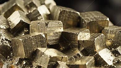 Glistening Gold Mineral With Facets. Sparkling Crystal Displaying Cubed Surface Details. Closeup Picture Of Radiant