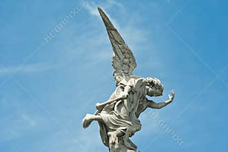 Angel, falling angel on Cemetery La Recoleta in Buenos Aires