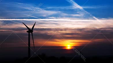 Wind turbine by sundown