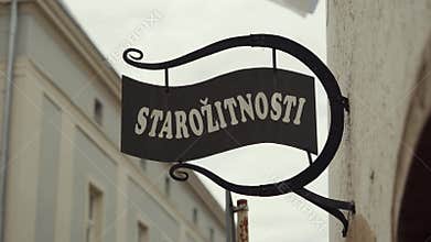 Vintage Czech Republic Antiques sign from wrought iron Starozitnosti = Antiques