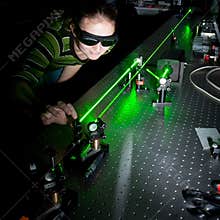 Female scientist in a quantum optics lab