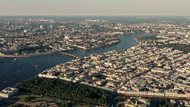 Drone shot of Saint Petersburg, banks and islands on water, under blue cloudy sky