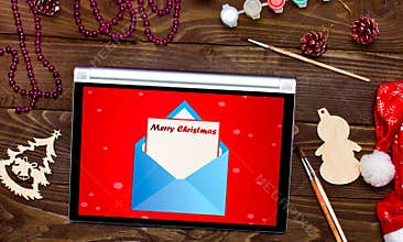 Merry Christmas, received an email on the tablet. Christmas background template