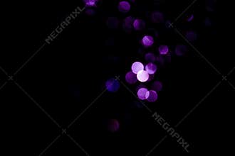 Abstract background purple bokeh with black background