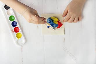Step by step instruction: how to make plaster molding figures. Concept of DIY and children`s creativity. Making bas-reliefs on