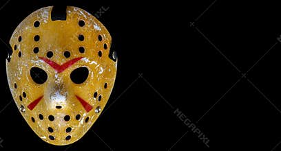 Bloody hockey mask worn by slasher Jason Voorhees from the Friday the 13th movie franchise on the black background.