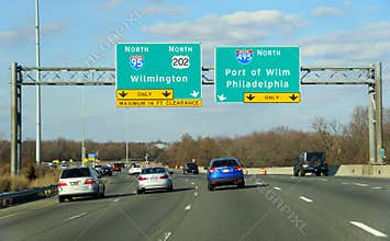 Wilmington, Delaware, U.S.A - February 9, 2020 - Highway signs on Interstate 95, Route 202 and Interstate 495 splits