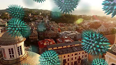 Macro corona virus spreading with cityscape in the background