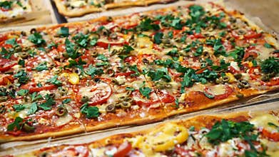 Pizza with tomato, pepper and cheese. Delicious fresh pizza served on wooden table