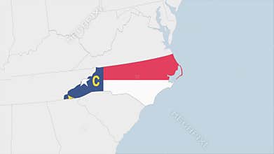 US State North Carolina map highlighted in North Carolina flag colors and pin of country capital Raleigh